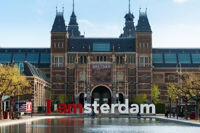 1 Hour Private Amsterdam Rickshaw Tour - Nieuwmarkt and the Waag gate: a calmer historic pause