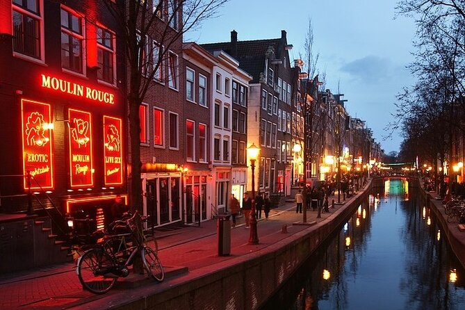 5 hrs Golden Age Amsterdam Private Walking Tour With Local Guide - Het Waag: guild HQ and the old gate role