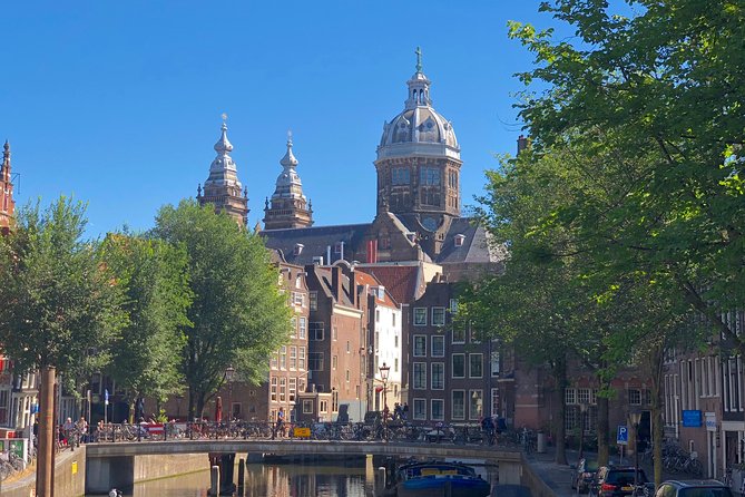 Absolutely Amsterdam - the Essential Introductory Walking Tour - Waterlooplein Market and the Jewish Quarter After WWII