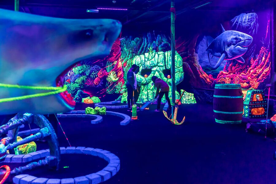 Aloha Amsterdam: 12-Hole Glow-in-the-Dark Mini-Golf - Pirates and underwater worlds under UV lights