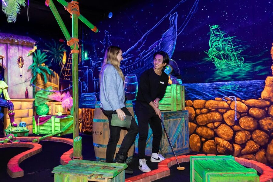 Aloha Amsterdam: 12-Hole Glow-in-the-Dark Mini-Golf - Price and value, $10 per person, plus the one payment caution