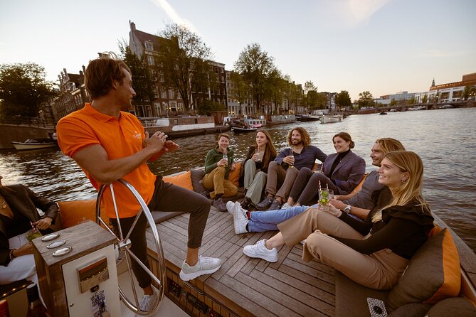 Amsterdam: 1-Hour Canal Cruise in the Evening - Amstel River highlights: the bridge names you’ll spot later