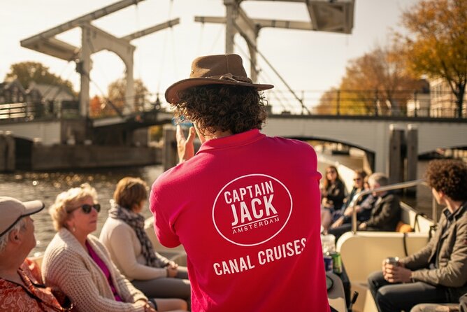 Amsterdam 1-Hour Canal Cruise With Live Guide - Rijksmuseum dock views, plus art stopovers seen from the canal