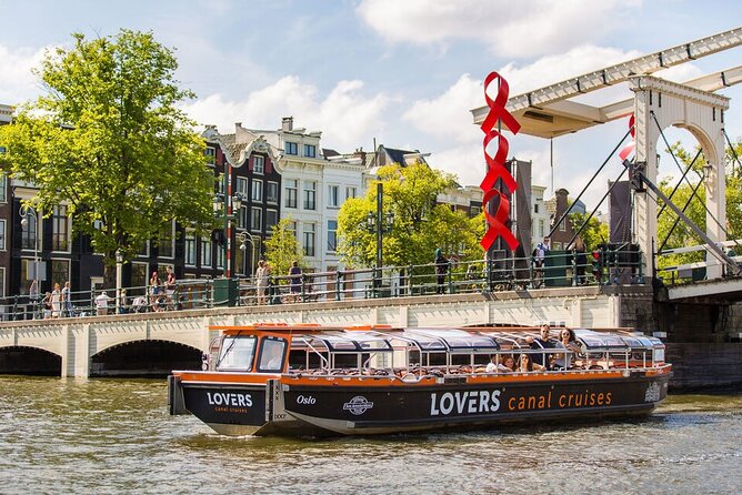 Amsterdam 1h Canal Cruise by Semi-Open Boat with Audio Guide - Where You Start on Prins Hendrikkade 20 (and How to Avoid Dock Chaos)