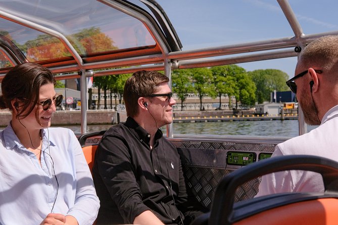 Amsterdam 1h Canal Cruise by Semi-Open Boat with Audio Guide - The One-Hour Route: Red Light District, Magere Brug, and More