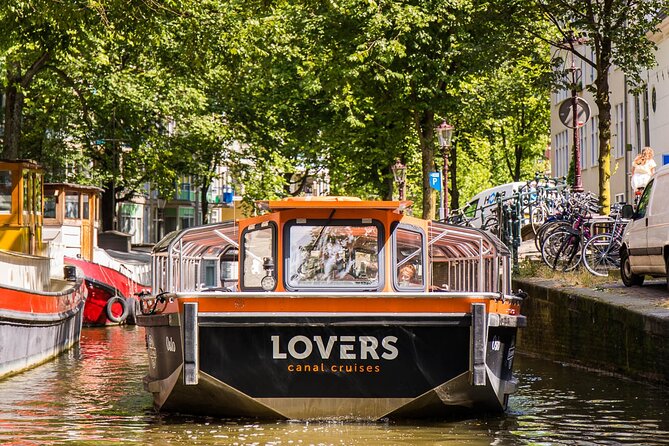 Amsterdam 1h Canal Cruise by Semi-Open Boat with Audio Guide - Skinny Bridge Up Close: Magere Brug From the Water