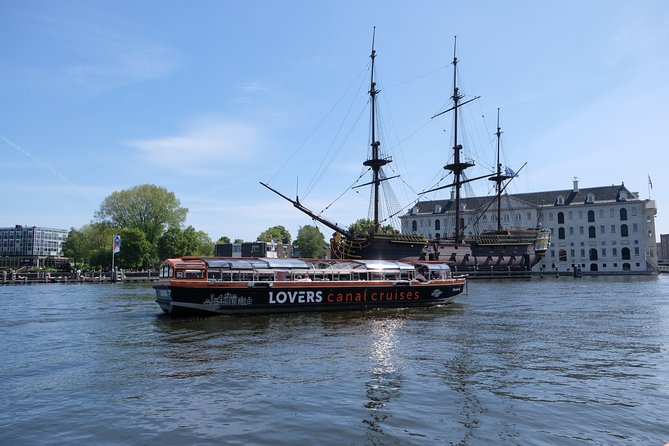 Amsterdam 1h Canal Cruise by Semi-Open Boat with Audio Guide - Museums and Heineken by Canal: Culture Without the Line