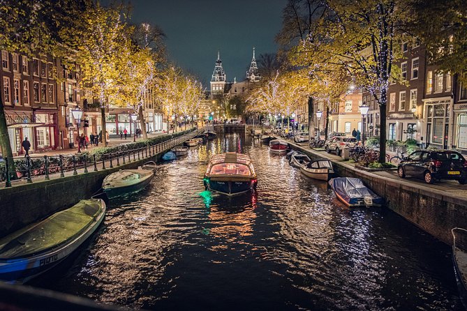 Amsterdam 2-Hour Evening Cruise With Live Guide and Bar - A 2-hour evening canal cruise that feels like a guided walk, on water