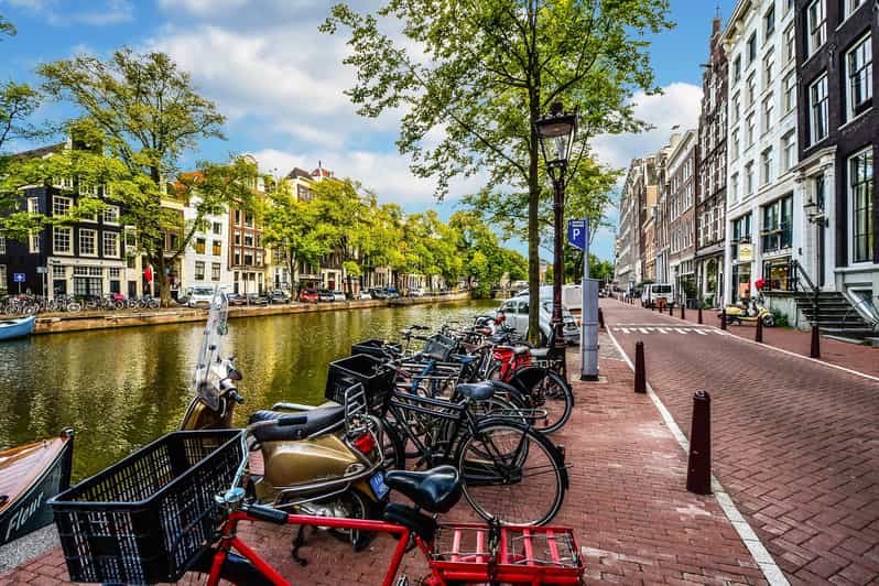 Amsterdam: 3-Hour Private Bike Tour of the City Center - Dam Square to the Westerkerk, where the city’s symbolism shows up fast