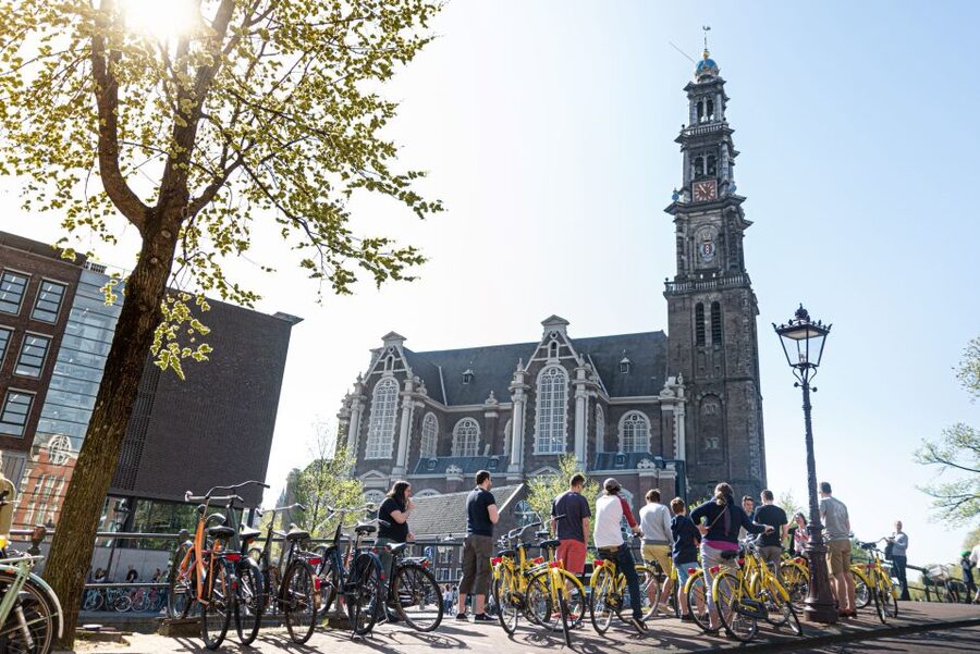 Amsterdam: 3h E-Bike Tour with break - The harbor-to-canals route: how the city opens up