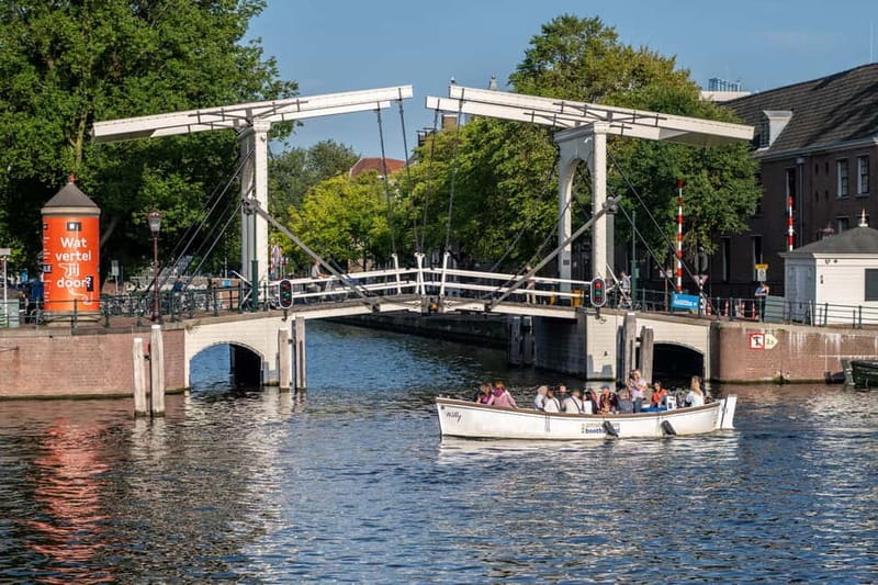 Amsterdam: 75 minute Open Boat Canal Cruise with Live Guide - Your captain’s live narration: why it feels worth the money