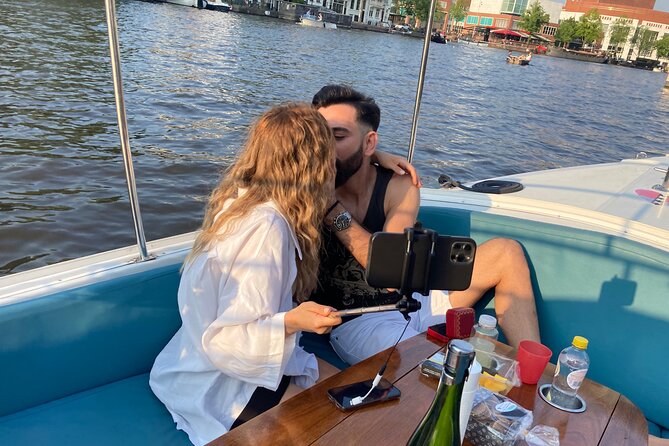 Amsterdam 90-min Private Canal Cruise with Live Guide and Drinks - Prinsengracht Start Point and How the Boat Fits Amsterdam Weather