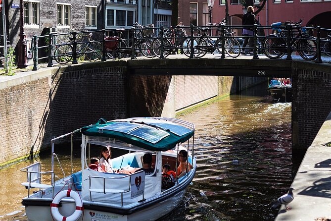Amsterdam 90-min Private Canal Cruise with Live Guide and Drinks - Amstel and Monet’s Canal: Old Waterway, Old Light