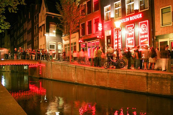 Amsterdam After Dark: Public Red Light District Exploration - Stop 3: The Waag, the stock market, and the torture chamber story