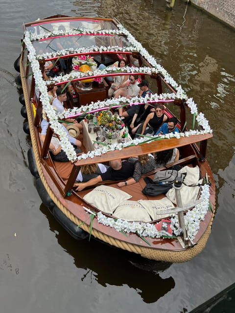 Amsterdam: Boat Tour with Optional Unlimited Drinks - Entering the Enterprise boat: what this cruise feels like