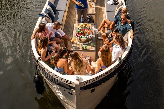 Amsterdam: Canal Booze Cruise with Unlimited Drinks Option - Why a one-hour canal booze cruise is smart in Amsterdam