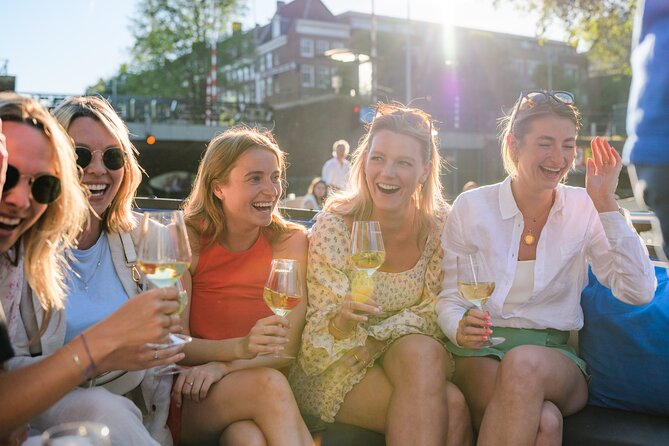 Amsterdam: Canal Booze Cruise with Unlimited Drinks Option - Hosts, captain, and small-group energy that makes the hour feel easy