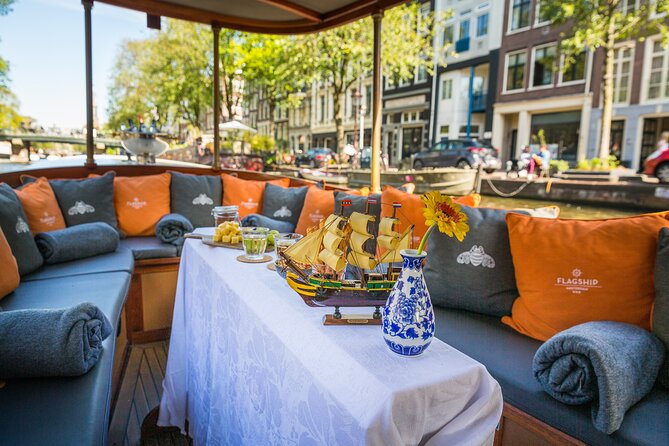 Amsterdam Canal Cruise in Classic Salon Boat With Drinks and Cheese - The classic salon boat experience, and how to plan for the ride