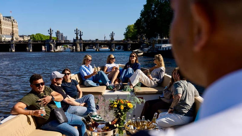 Amsterdam: Canal Cruise in Open Boat with Drink Option - Key highlights worth your time
