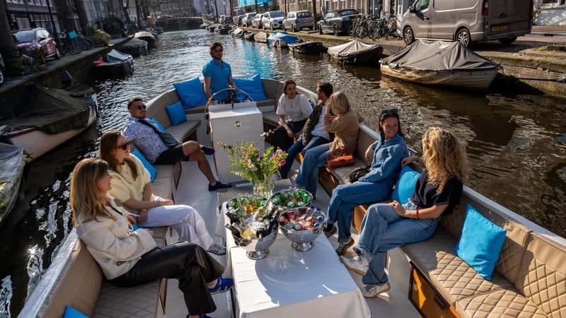 Amsterdam: Canal Cruise in Open Boat with Drink Option - Best fit for your Amsterdam plans