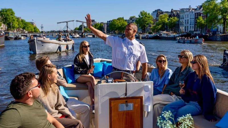 Amsterdam: Canal Cruise in Open Boat with Drink Option - Picking Central Station or the Anne Frank House area
