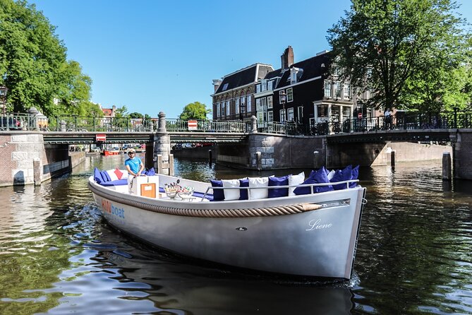 Amsterdam Canal Cruise in Open Boat with Unlimited Drinks Option - Cruising past the Hermitage Museum and why that stretch feels special