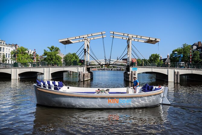 Amsterdam Canal Cruise in Open Boat with Unlimited Drinks Option - UNESCO canal belt views, delivered at canal-ride speed
