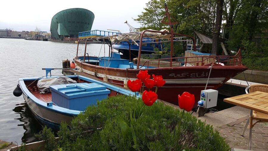 Amsterdam: Canal Cruise on a Wooden Refugee Boat - The 90-Minute Route: Canals and the Amstel, Kept at a Human Pace