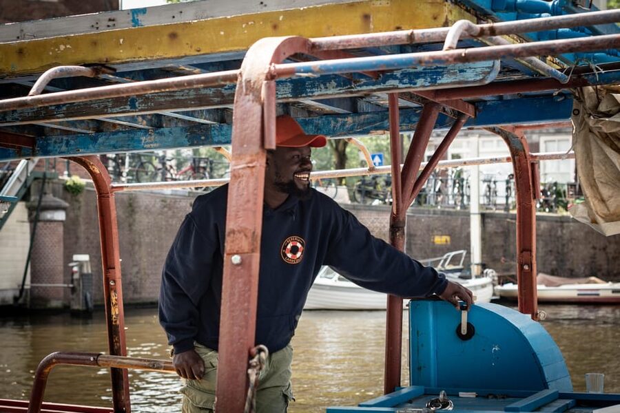Amsterdam: Canal Cruise on a Wooden Refugee Boat - How Smuggling Routes and Refugee Boats Become Part of Amsterdam’s Waterways