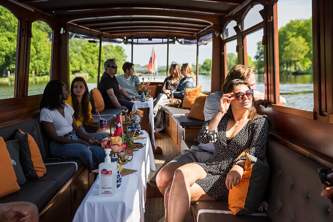 Amsterdam Canal Cruise with Cheese and Wine - A 1-Hour Canal Cruise That Gets You Oriented Fast in Amsterdam