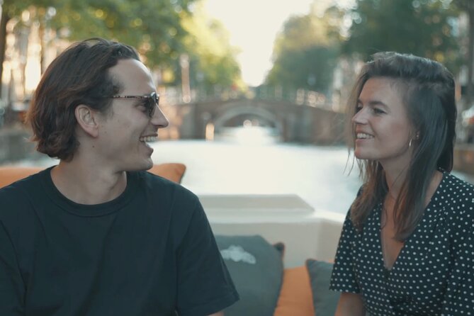 Amsterdam Canal Cruise with German Guide and unlimited drinks - Herengracht, the Seven Bridges, and the love bridge for instant wow
