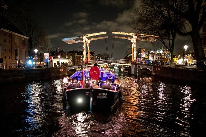 Amsterdam Canal Cruise With Live Guide and Unlimited Drinks - Guides with jokes and real local stories, from Jack to Olaf