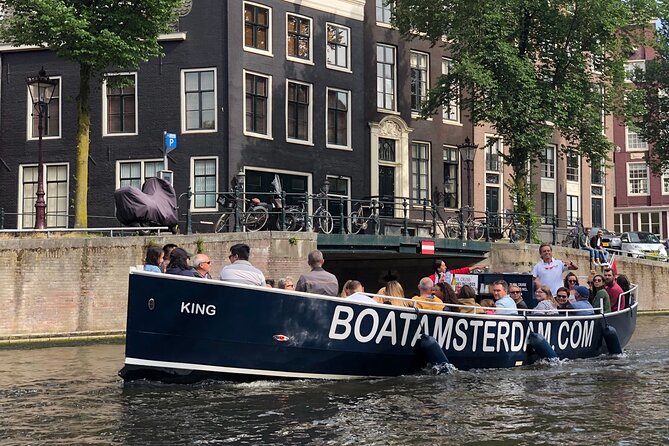 Amsterdam Canal Cruise with Open Bar - Central Station - Open bar value: unlimited Heineken, wine, coffee, and tea