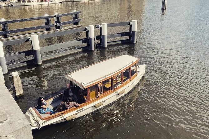 Amsterdam Champagne Private Canal Cruise - What the on-board crew experience feels like in real life