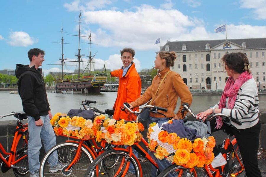 Amsterdam: Cheese, Windmill & Countryside Bike Tour - Nieuwendammerdijk Dike Riding and IJ River Views