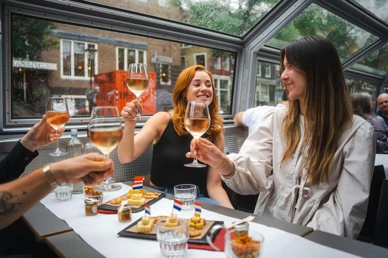 Amsterdam: Cheese & Wine Cruise Tasting Experience - Heated Boat Comfort and Canal Belt Views at Night