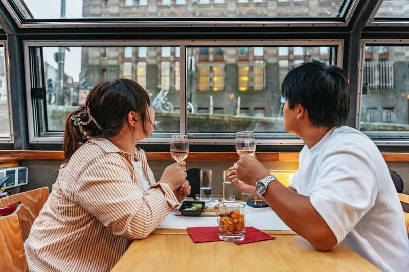 Amsterdam: Cheese & Wine Cruise Tasting Experience - The 75-Minute Route: From Damrak to Magere Brug, Landmark by Landmark