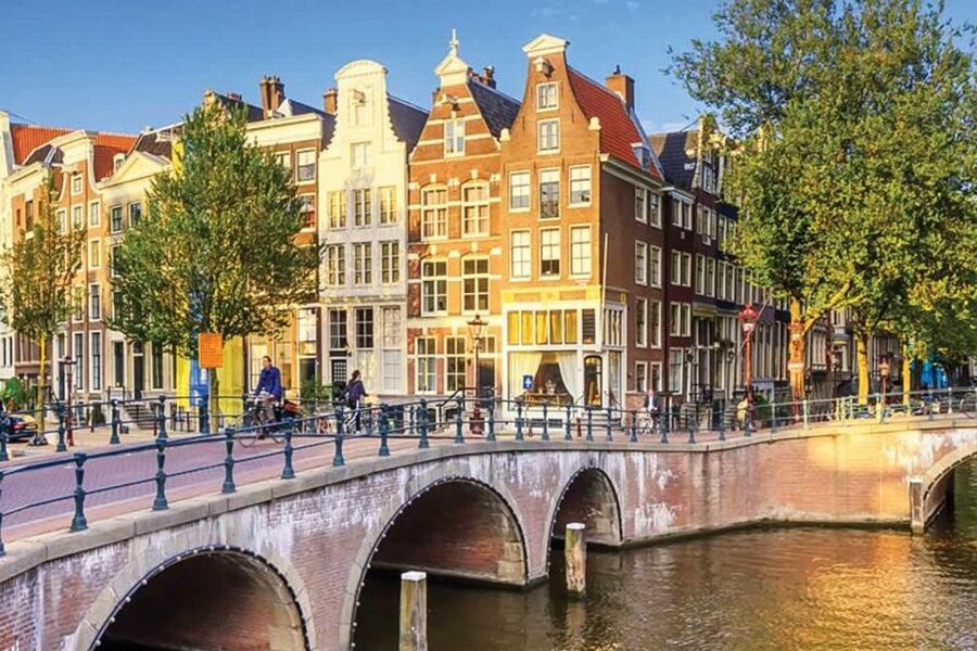 Amsterdam City Center Guided Walking Tour - 12 guests 2,5h - Churches, Towers, and the Canal-Era City Engine (St Nicholas, Weeping Tower, Zeedijk)