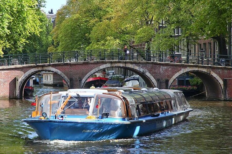 Amsterdam City Center Guided Walking Tour - 12 guests 2,5h - Oude Kerk and Nieuwmarkt: Old Square Energy and Market-Proof Orientation