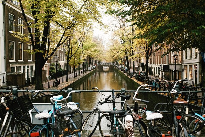 Amsterdam City Center Guided Walking Tour Semi-Private 12ppl Max - Oost-Indisch Huis courtyard: the East India Company and early globalization