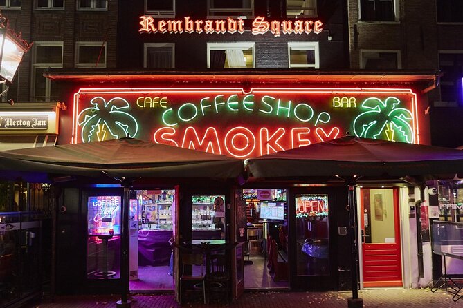 Amsterdam City Center, Red Light District and Coffee Shops Tour - The Old Church, coffeeshops, cabins, and the city’s contradictions