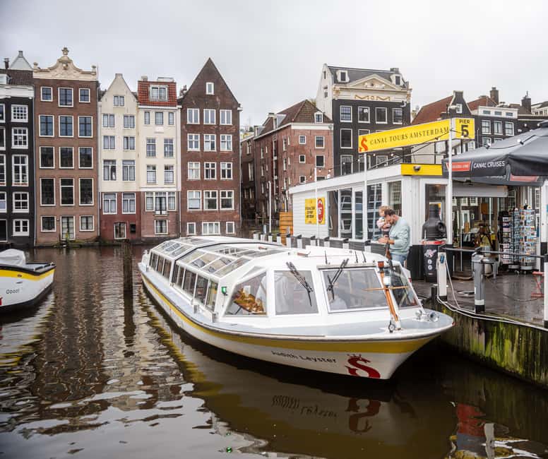Amsterdam: City Centre Canal Cruise & Free Flower Cocktail - Magere Brug to the Dancing Houses: Bridge Drama and Photo-Friendly Moments