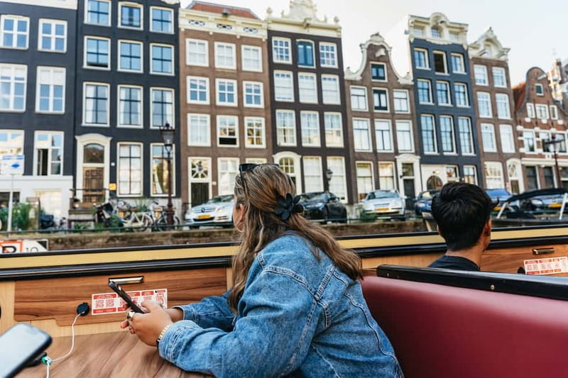 Amsterdam: City Centre Canal Cruise & Free Flower Cocktail - Audio Guide Through Speakers, App Languages, and the Headphones Check
