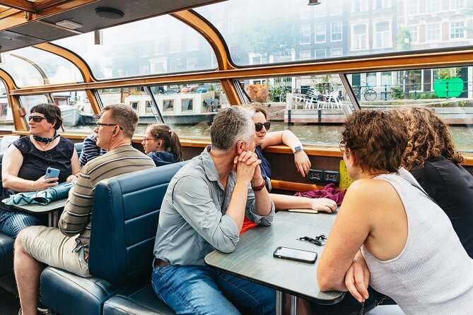 Amsterdam City Centre Cruise on heated boat with Audioguide - Audio Guide Reality: Multi-Language Narration and No Headphones