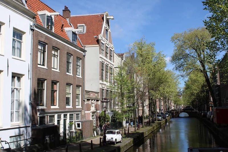 Amsterdam: City walking experience with a local - The Bike Culture and Amsterdam’s 3 XXXs