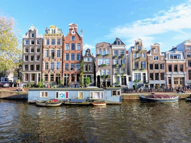 Amsterdam: City walking experience with a local - Dam Square to Spui Square, Big Places With Real Meaning
