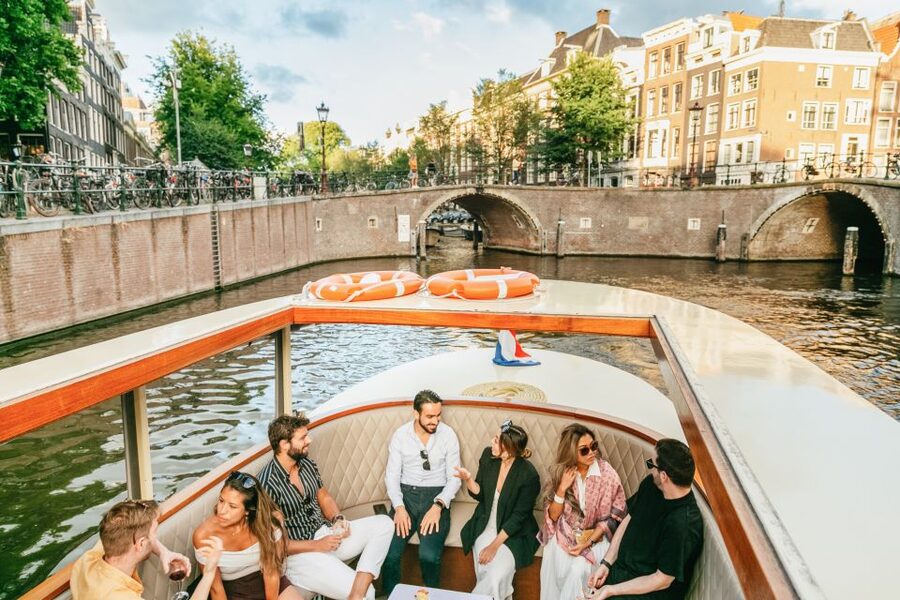 Amsterdam: Classic Boat Cruise with Optional Cheese & Wine - Practical comfort: what to bring and what to watch for when boarding