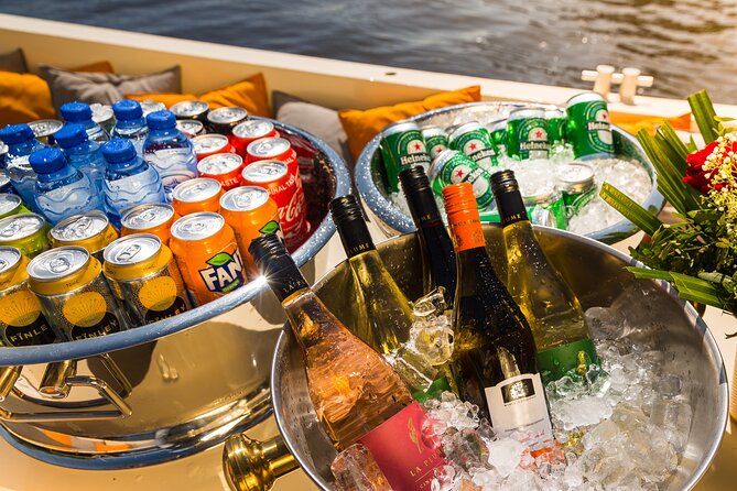 Amsterdam Classic Saloon Boat Canal Cruise with Live Guide - Herengracht, the bridges, and why water level changes what you see