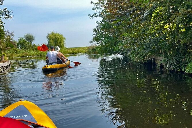 Amsterdam Countryside Bike and Kayak Tour - Watergang, kayaking the wetlands, and the church break that makes it memorable