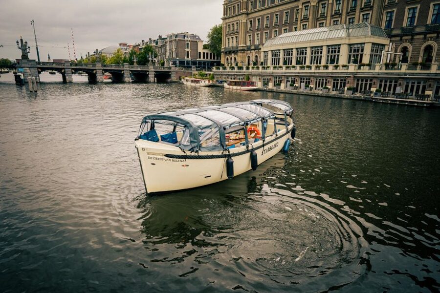 Amsterdam: Covered Canal Booze Cruise with Unlimited Drinks - Amsterdam Canal Views, With a Beer in Hand